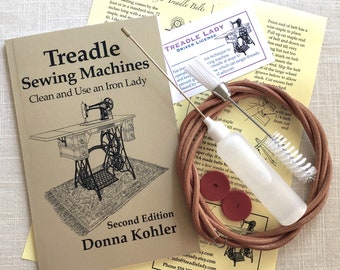 Kit of Treadle Sewing Machine Signed Book, Leather Treadle Belt, Oiler with Oil, Double End Lint Brush and Spool Pin Felts