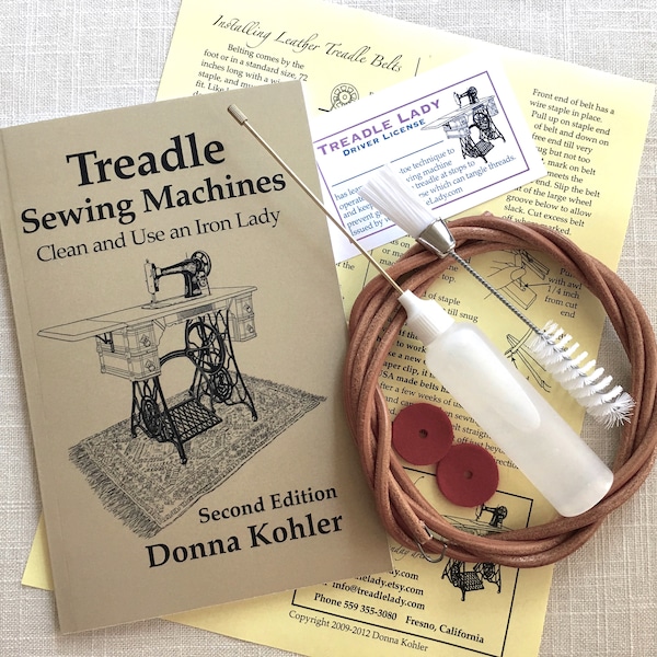 Kit of Treadle Sewing Machine Signed Book, Leather Treadle Belt, Oiler with Oil, Double End Lint Brush and Spool Pin Felts