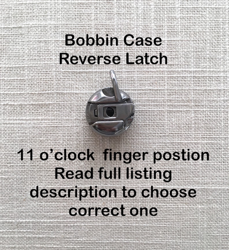 May include: A silver bobbin case with a reverse latch. The bobbin case has a finger position at 11 o'clock. Read the full listing description to choose the correct one.