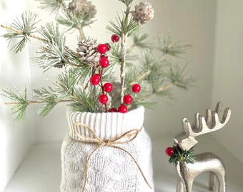 Christmas decor sweater vase and silver reindeer for tier tray decor, cable knit sweater vase with pine branches and red berries