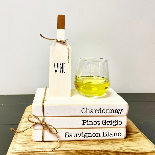 Faux wine, mini wine glass, book stack, tiered tray decor, White wines