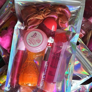 May include: A set of three ceramic mugs with a speckled, matte finish. The mugs are in shades of cream, light gray, and dark gray. Each mug has a simple, minimalist design, perfect for coffee or tea.