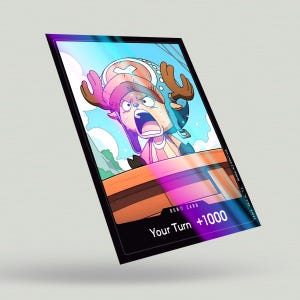 May include: A cartoon illustration of a character from the anime One Piece. The character is wearing a red and white hat with antlers and a pink shirt. The character is shouting "Your Turn +1000".