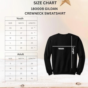 May include: Size chart for a Gildan 18000B crewneck sweatshirt. The chart includes youth and adult sizes, with measurements in inches for width and length. A black sweatshirt is shown with width and length indicators.