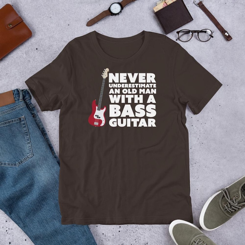 Never Underestimate An Old Man With A Bass Guitar T-Shirt | Guitar Tshirts | Bass Shirt | Funny Music Shirts | Bass Player Shirt | Gift For Bassist | Bassist Shirt | Bass Player | Brown