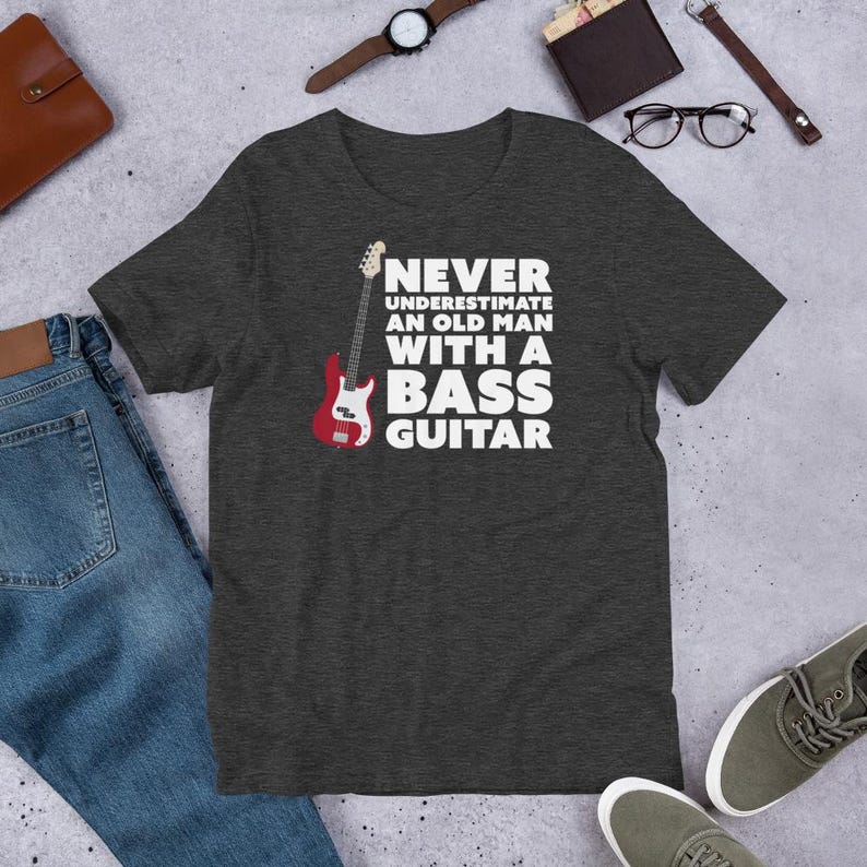 Never Underestimate An Old Man With A Bass Guitar T-Shirt | Guitar Tshirts | Bass Shirt | Funny Music Shirts | Bass Player Shirt | Gift For Bassist | Bassist Shirt | Bass Player | Heather Grey