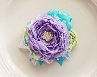 Lavendar, Turquoise and lime Flower clip