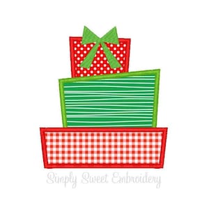 May include: A stack of three red and green Christmas presents with a green bow on top. The bottom present has a red and white checkered pattern, the middle present has green and white stripes, and the top present has red and white polka dots.