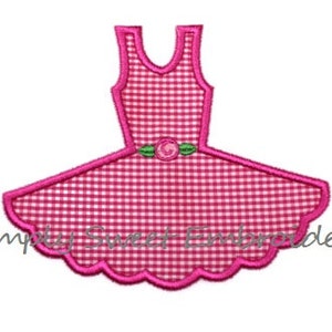 May include: Pink gingham dress with a green flower and a ruffled hem. The dress is a digital embroidery design.