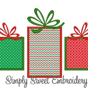 May include: Three embroidered Christmas gift boxes with different patterns. The boxes are green with red trim and red bows. The text "Simply Sweet Embroidery" is at the bottom of the image.