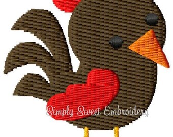 May include: Embroidered design of a brown rooster with a red comb and wattle, orange beak, and yellow legs. The rooster is standing on a white background. The text "Simply Sweet Embroidery" is visible below the rooster.