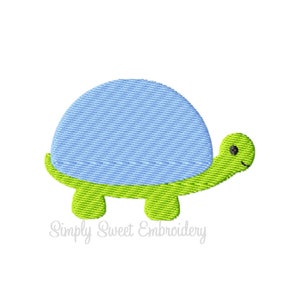 May include: A blue and green embroidered design of a turtle with a smiling face.
