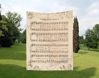 May include: A beige tapestry featuring musical notes and lyrics from the Christmas carol "O Come All Ye Faithful." The tapestry has decorative elements of bells, stars, and snowmen. The background is a green lawn and trees.
