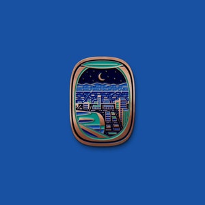 Mainland Enamel Pin (Airplane Window Seat of Nighttime Cityscape)