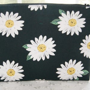Estuche organizador de cartera con cremallera y margaritas, estilo de fondo plano, tela de algodón negra, blanca y amarilla