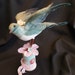 Vintage Spun Cotton Bird atop an Embellished Spool