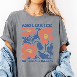 Floral Abolish ICE Human is Illegal Shirt, Political Resistance Shirt, Anti-Trump Activist Wear, No Human is Illegal Top, DACA Shirt