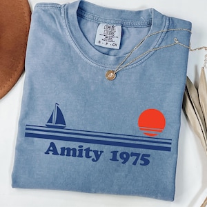 Comfort Colors® Jaws Amity 1975 Unisex Tee, Amity Island Shirt, Vintage Movie Tee, Retro Graphic Tee, Beach Vacation Shirt