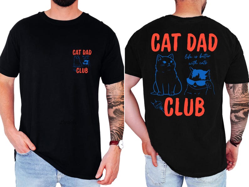 May include: Black t-shirt with the text "CAT DAD CLUB" in red and blue. The front features a small graphic, while the back displays two cat illustrations and the phrase "life is better with cats."