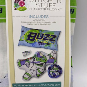 May include: A Disney Stitch 'n Stuff Character Pillow Kit featuring Buzz Lightyear. The kit includes a fabric panel, instructions, and all the materials needed to make three pillows and a pocket pal. The finished sizes are 19 inches by 12.5 inches for the character pillow, 18 inches by 10 inches for the travel pillow, 7 inches by 7 inches for the decor pillow, and 4.5 inches by 3 inches for the pocket pal.