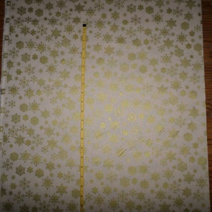 New Metallic Gold Snowflakes on Cream Christmas Cotton Fabric - selling by the yard