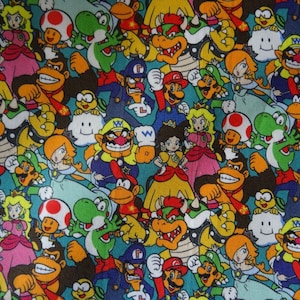 May include: A colorful fabric featuring a variety of Nintendo characters, including Mario, Luigi, Peach, Bowser, Donkey Kong, and Yoshi. The fabric is a teal blue color with a repeating pattern of the characters.