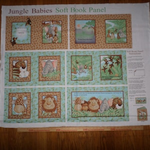 May include: A soft book panel for babies featuring jungle animals. The panel is divided into eight squares, each with a different animal and a short phrase. The animals include a giraffe, a lion, an elephant, a tiger, and monkeys. The panel is made of fabric and is designed to be sewn into a soft book.