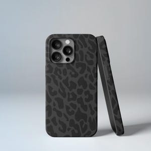 Svart leopardmönstrat, tufft telefonskal: iPhone och Samsung Galaxy.