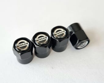 Tapones de válvula para neumáticos Nissan (4 unidades), color negro con logotipo, accesorios para coche