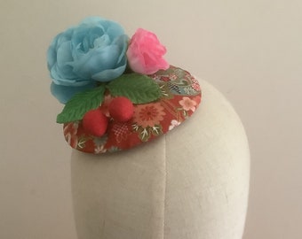 Red and blue kimono fabric cocktail hat.