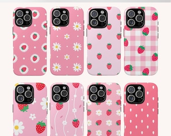 May include: A collection of pink phone cases with strawberry and daisy patterns. Some cases feature a gingham design. The text "Strawberry Fun Phone Cases" is at the top of the image.