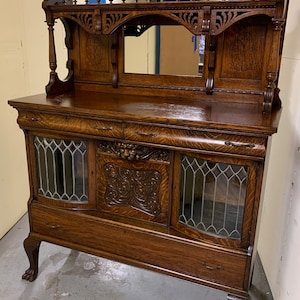 Antique quarter sawn oak sideboard Buffet leaded glass doors 20d48w40h66h Shipping is not free