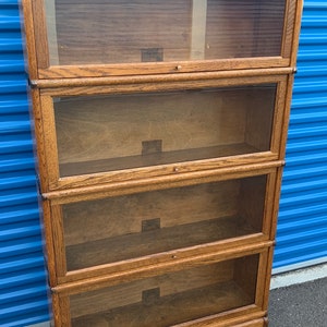 Globe Wernicke four stack light oak barrister pristine condition 11d34w62h Shipping is not free