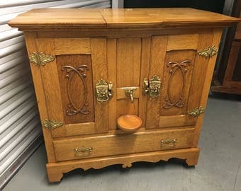 Antique oak ice chest refridgerator gravity fed water dispenser 37.5h40w23d shipping is not free