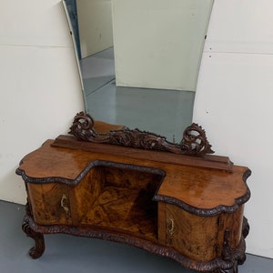 Early 1900s carved Italian style mirrored vanity in maple and walnut 15h26h65h18d52w Shipping is not free