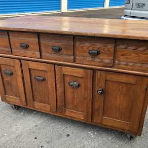 Antique 1889 NY solid oak bakers cabinet island cupboard 53w27d33.5h Shipping is not free