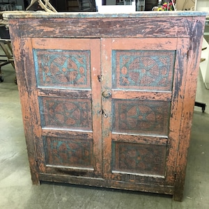 Beautiful American Primitive Walnut 12 star tin pie safe 16.5d42w45h Orange and blue paint two shelves Shipping is not free