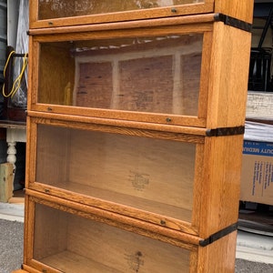 Antique 1896 solid oak Globe Wernicke 4 stack barrister bookcase 12d9.5d34w65h Shipping is not free