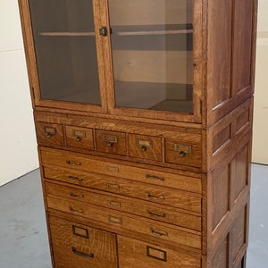Antique Globe Wernicke oak stacking file system bookcase cabinet 33W25D72H Shipping is not free