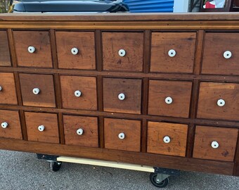Primitive 18 drawer pine apothecary cabinet cupboard 53.5W15.5D28h square nails porcelain knobs Shipping is not free