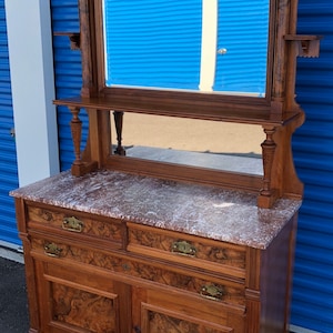 Victorian walnut mirrored marble top sideboard burl features 48w21d36h86h Shipping is not free