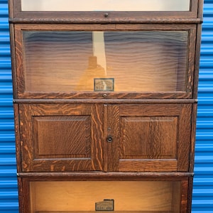 Globe Warnicke tiger oak four stack barrister w/cabinet section 34W64h12.5d Shipping is not free