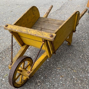 Wooden wheel barrels discount