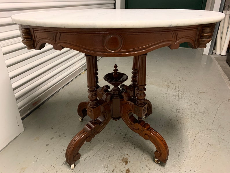 Antique Victorian marble top parlor table highly carved base Etsy