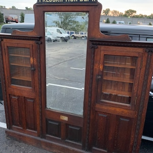 Antique 1900 New York solid oak drugstore apothecary wall cabinet 76w7d60h79h Shipping is not free