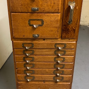 Unique antique 1907 Shaw Walker oak sectional file cabinet with pull out desk  16w19d42h Shipping is not free