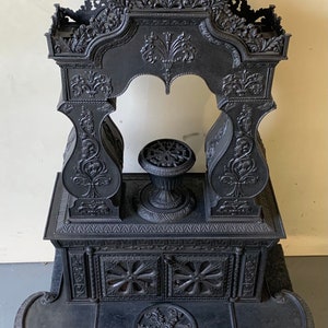Exquisite 1830&#39;s victorian antique parlor stove Sits on 4 claw feet 44h55h18d11d7d34w shipping is not free