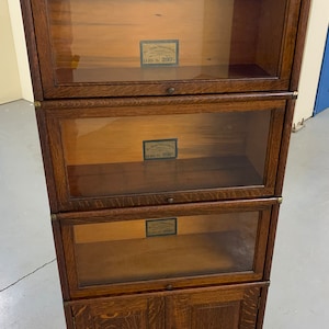 Antique quartersawn oak 4 section globe wernicke 3/4 size barrister stacking bookcase 25.5W12.5D61.5H shipping is not free