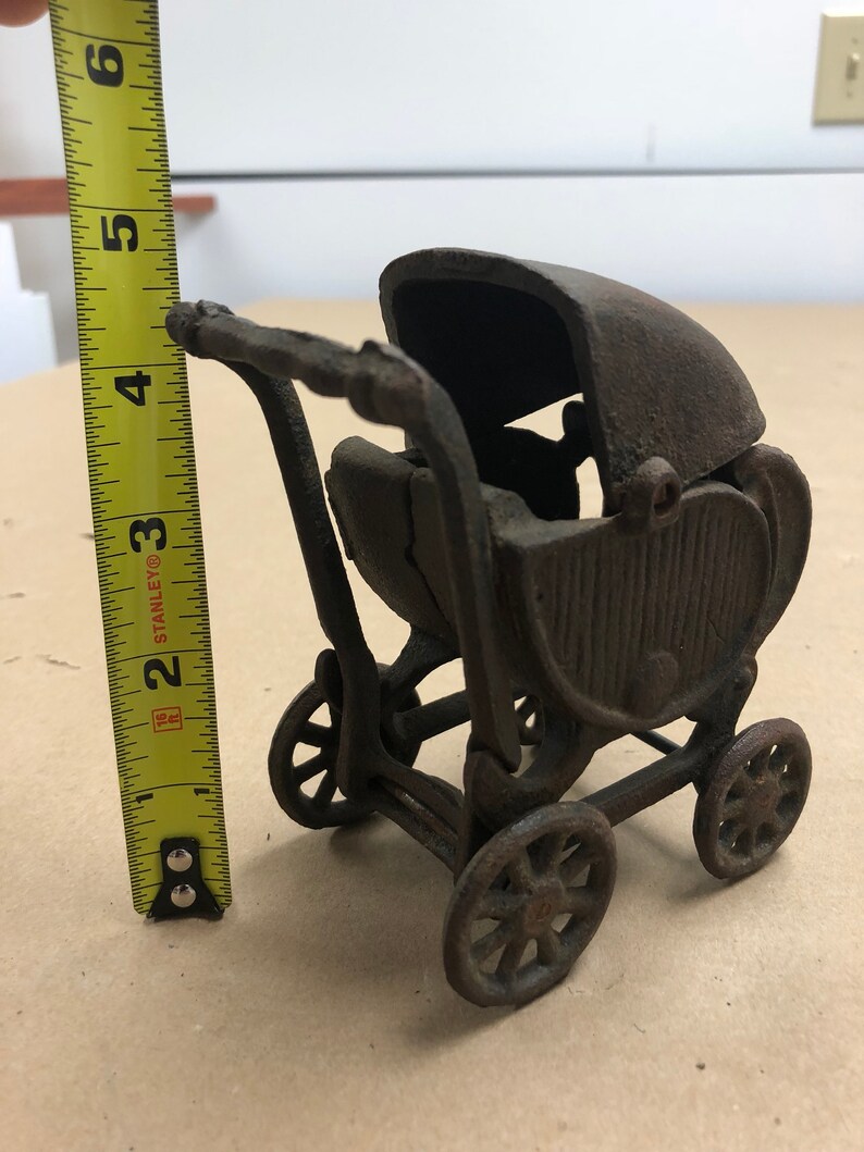 Antique cast iron doll baby buggy carriage rolling wheels Etsy