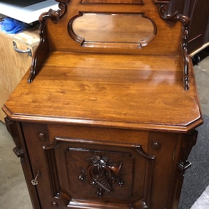 Antique Renaissance Revival walnut music cabinet with key 53h38h25w19d Shipping is not free